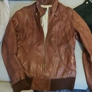 Vintage leather jacket w/ removable sleeves vest